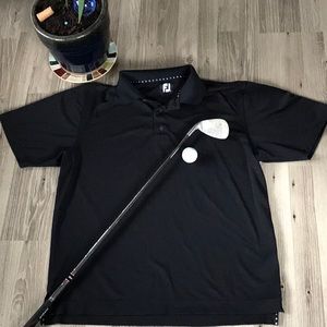 Men's FootJoy golf polo shirt in black, L
